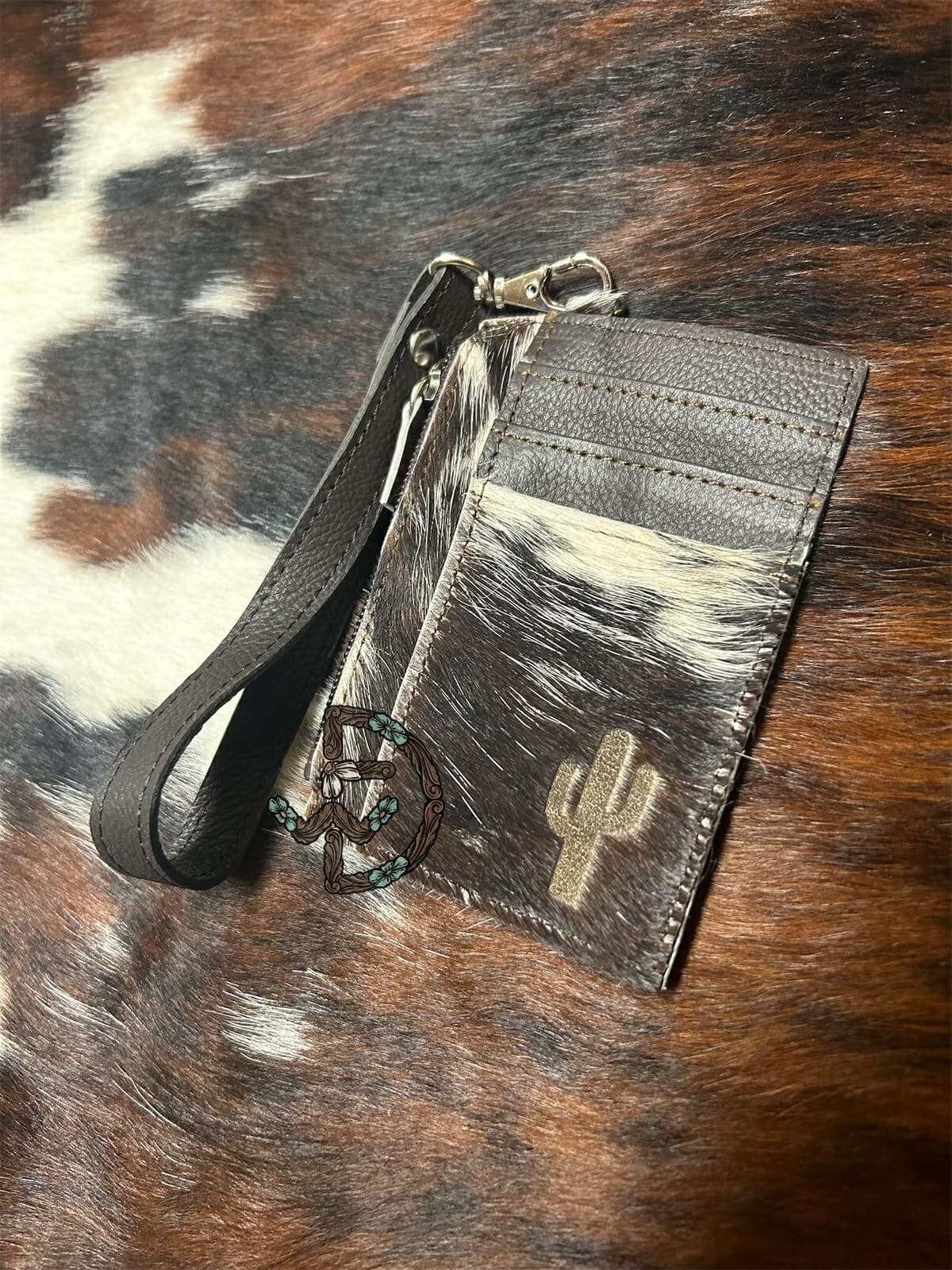 Engraved Cowhide Wristlet